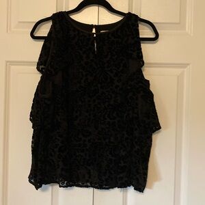 Beautiful velvet top with cold shoulder and ruffles around the sleeves